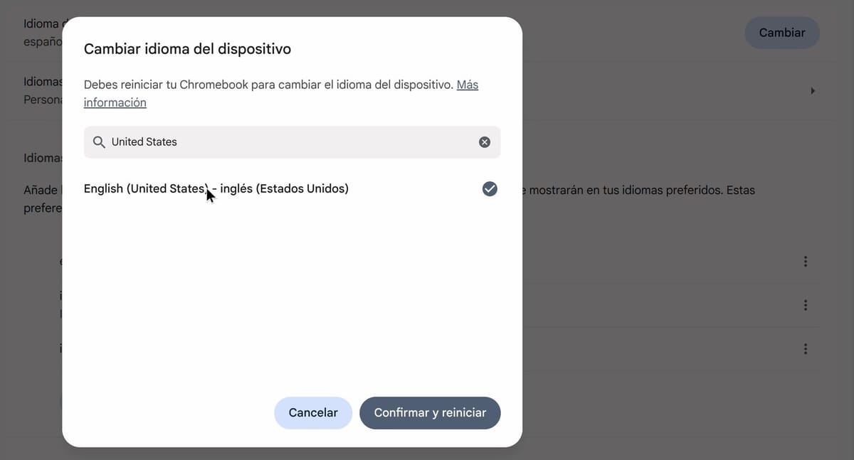 The Spanish Cambiar idioma del dispositivo dialog with United States in the search box, a single checked English (United States) row, and the Cancelar and Confirmar y reiniciar buttons