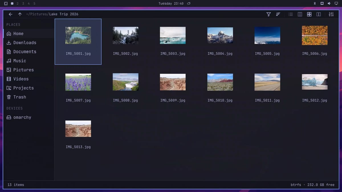 Flea in grid view on a Lake Trip 2026 folder, with thumbnails for thirteen landscape photos, including the last one, which is stored sideways in the file and shown upright