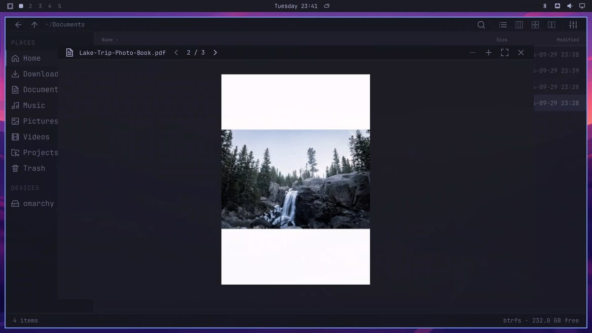 Flea's Quick Look showing page 2 of 3 of a PDF photo book, with a waterfall photo on the page