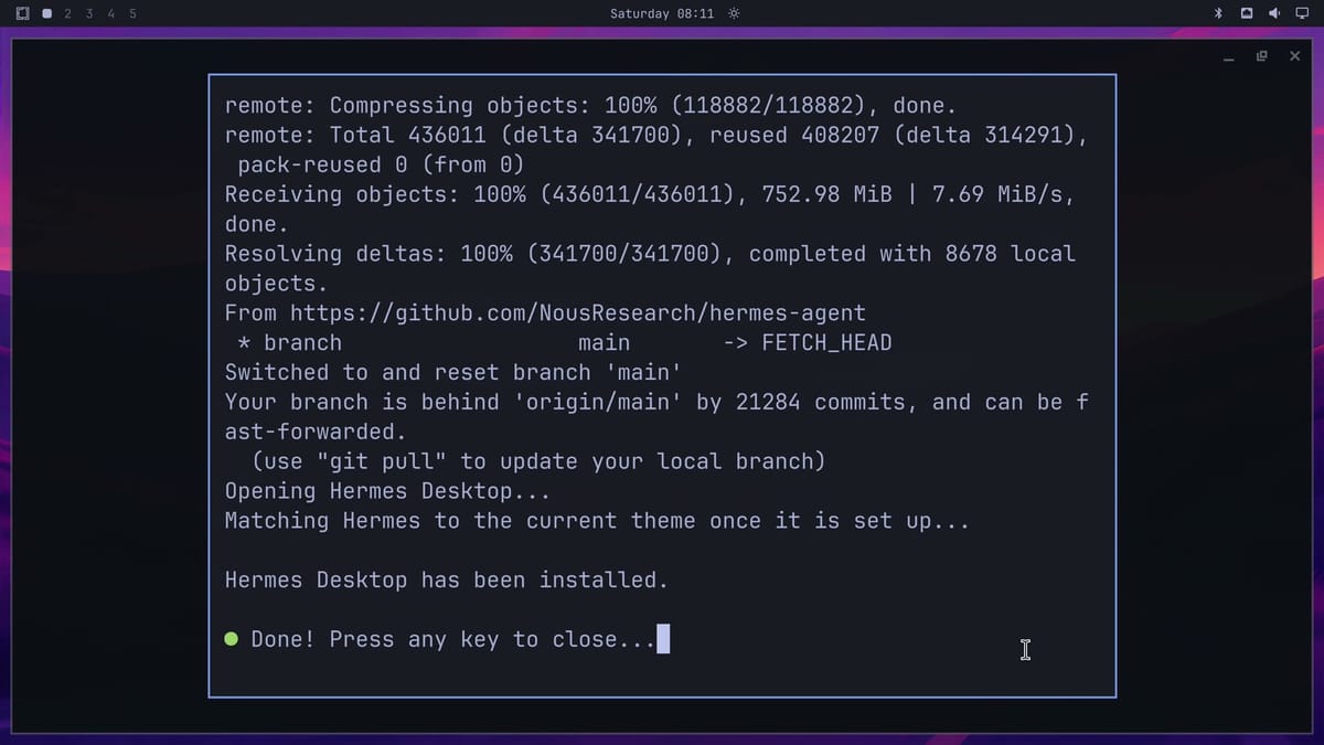 The install terminal reading Opening Hermes Desktop, Matching Hermes to the current theme once it is set up, Hermes Desktop has been installed, and Done! Press any key to close, with the Hermes window behind it
