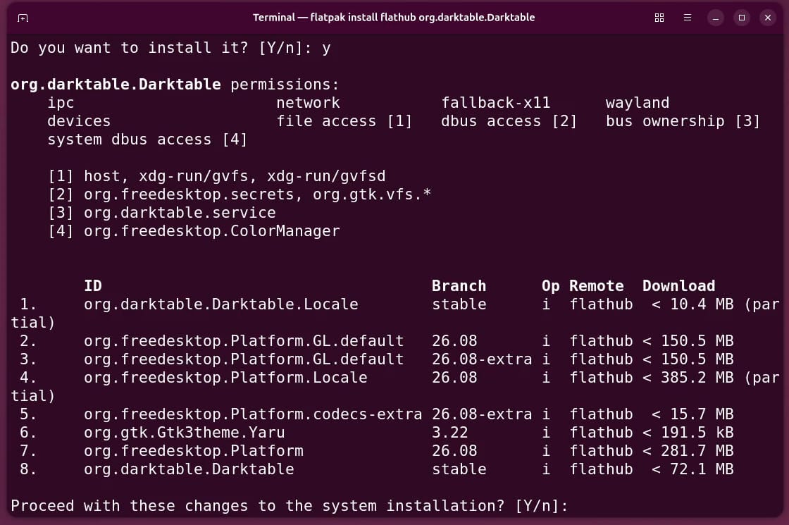 The flatpak install prompt listing darktable's permissions and eight items to download from Flathub, including org.darktable.Darktable and org.freedesktop.Platform 26.08, ending with Proceed with these changes to the system installation