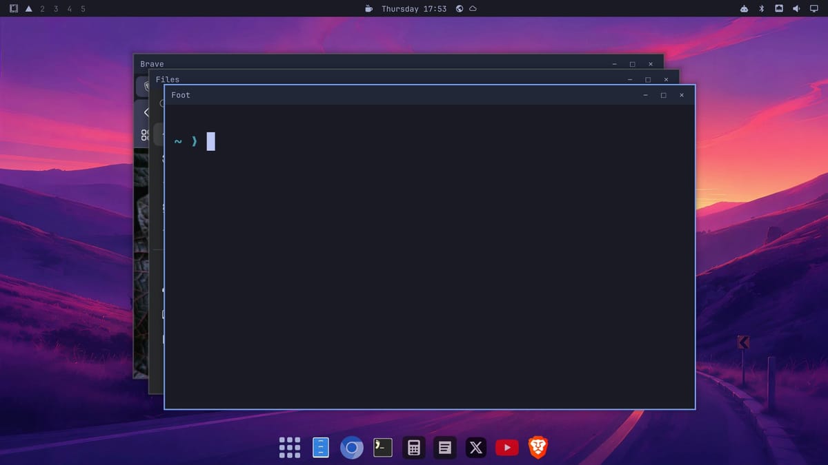 Omarchy in the floating layout: Brave, Files, and a terminal stacked with title bars, and a dock along the bottom of the screen