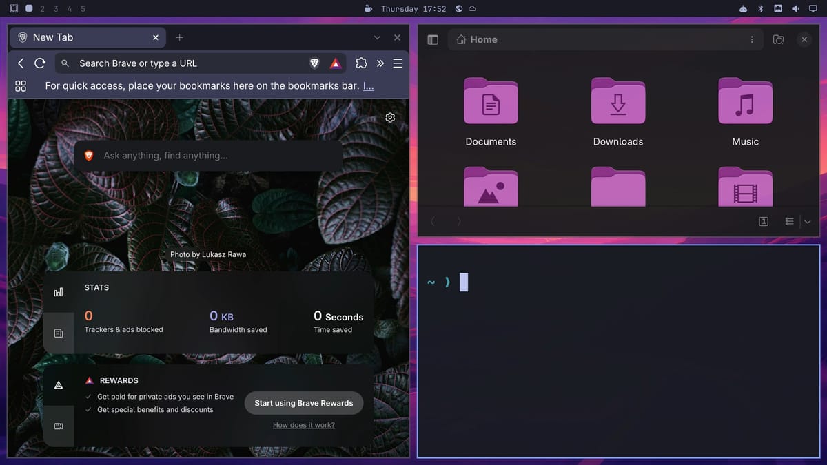 Omarchy with three tiled windows: Brave on the left half, Files and a terminal stacked on the right
