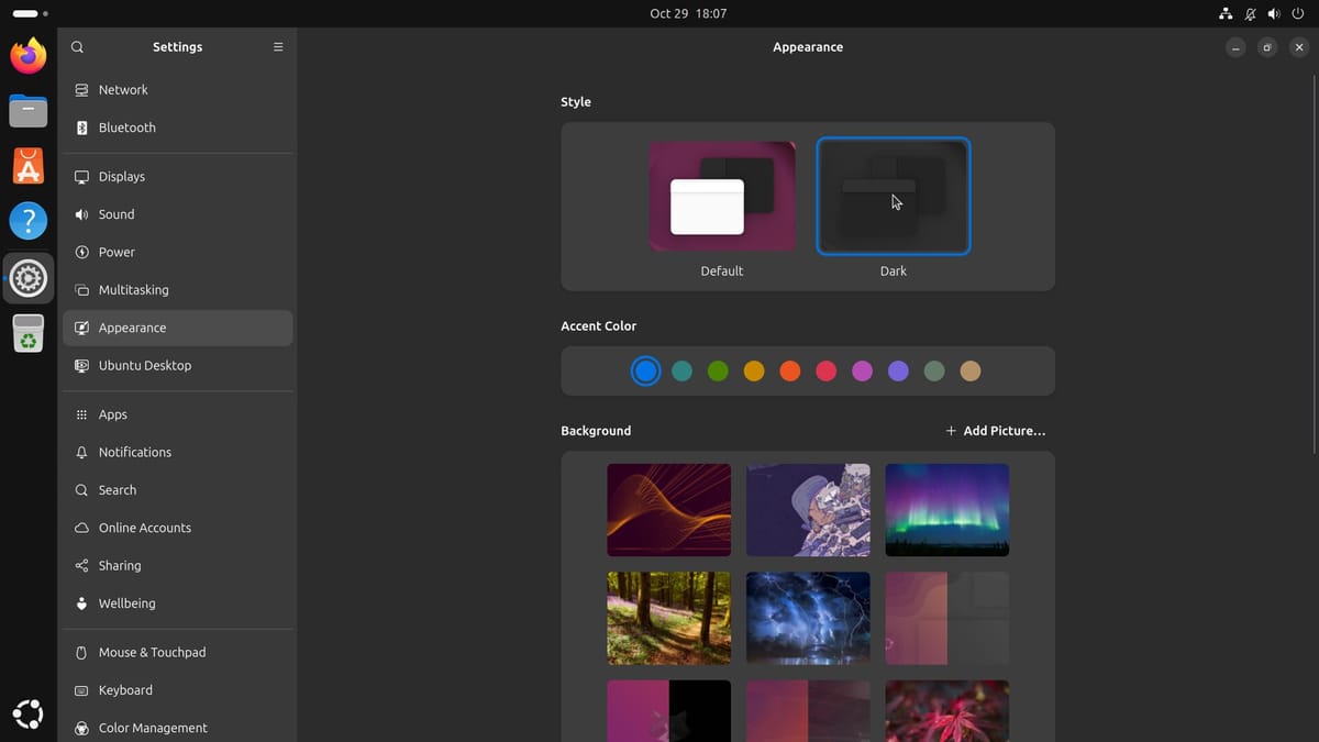 Ubuntu Settings on the Appearance page in the Dark style, with the blue accent color selected and the Background grid with Add Picture