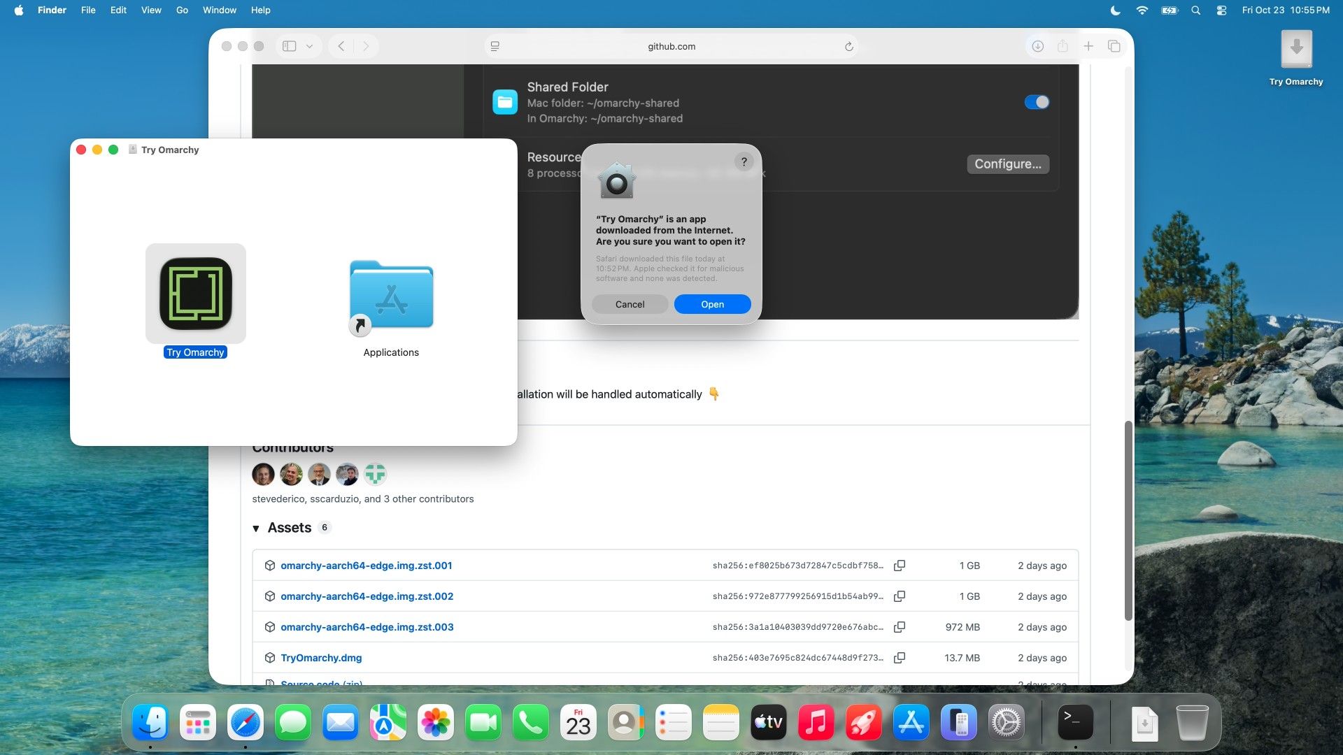 The macOS dialog asking whether to open Try Omarchy, an app downloaded from the Internet, with the note that Apple checked it for malicious software and none was detected, and Cancel and Open buttons, over the Try Omarchy disk image window