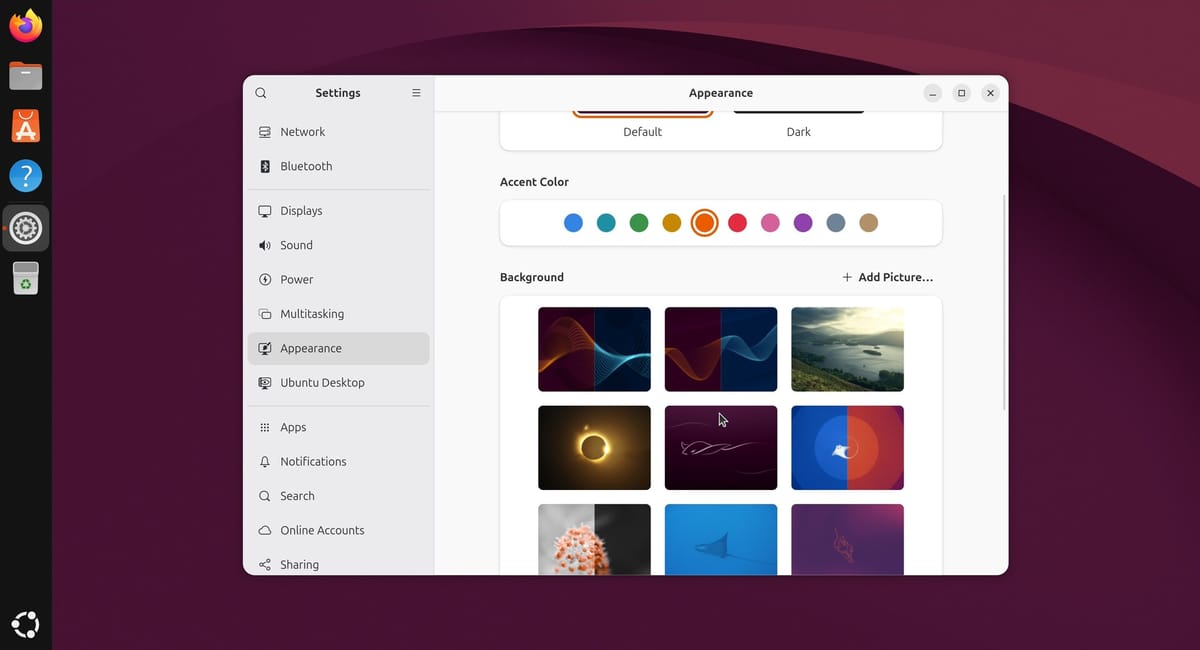 Settings open on Appearance in Ubuntu 26.10, with the Accent Color dots and a Background grid that includes stingray line art, a blue and red stingray, and an underwater stingray