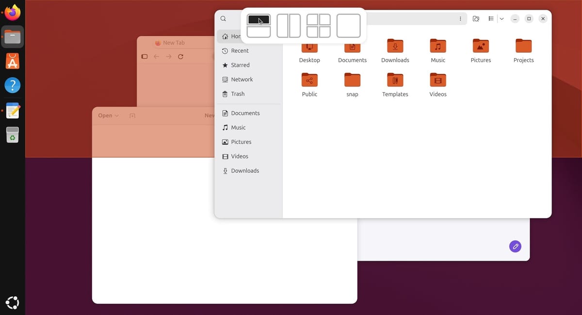 The Ubuntu 26.10 layout picker open at the top of the screen with four icons, the pointer on the top half of the first icon, and an orange preview covering the top half of the screen behind a Files window