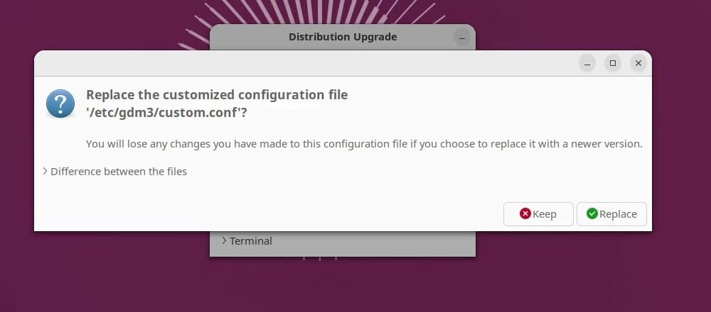 The upgrader asking whether to replace the customized configuration file /etc/gdm3/custom.conf, with a Difference between the files expander and Keep and Replace buttons