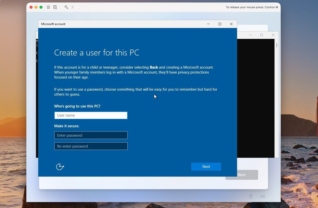 The Create a user for this PC window that start ms-cxh:localonly opens over Windows setup in VMware Fusion, with user name and password fields