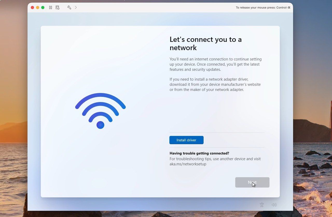 Windows 11 setup in VMware Fusion stopped on Let's connect you to a network, with an Install driver button and a greyed-out Next button